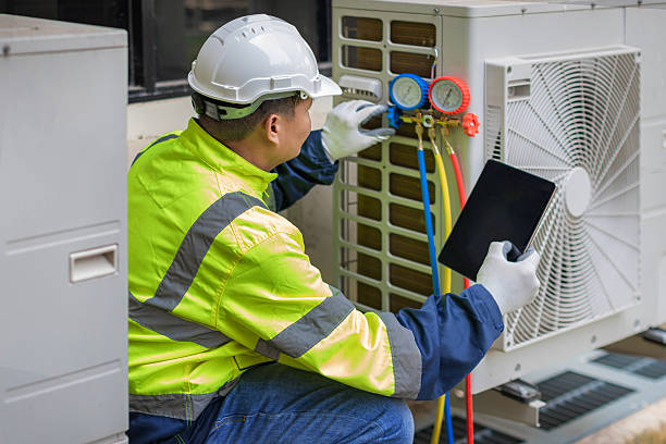Professional Heat Pump Repair technician working in Thackerville, OK
